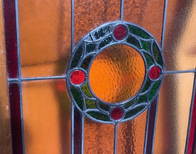 Detail of pair of stunning arched leadlight panels in timber frames ...